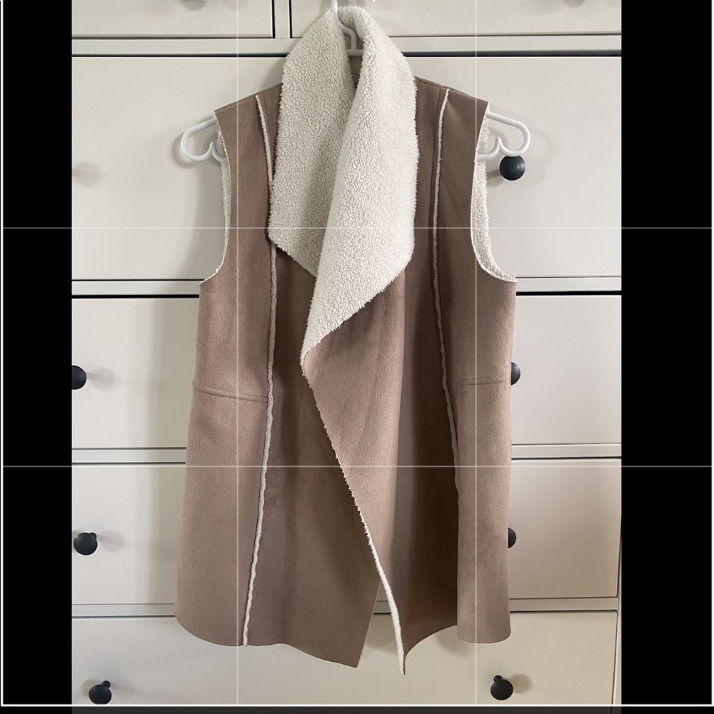 Oat and cream coloured sherpa vest